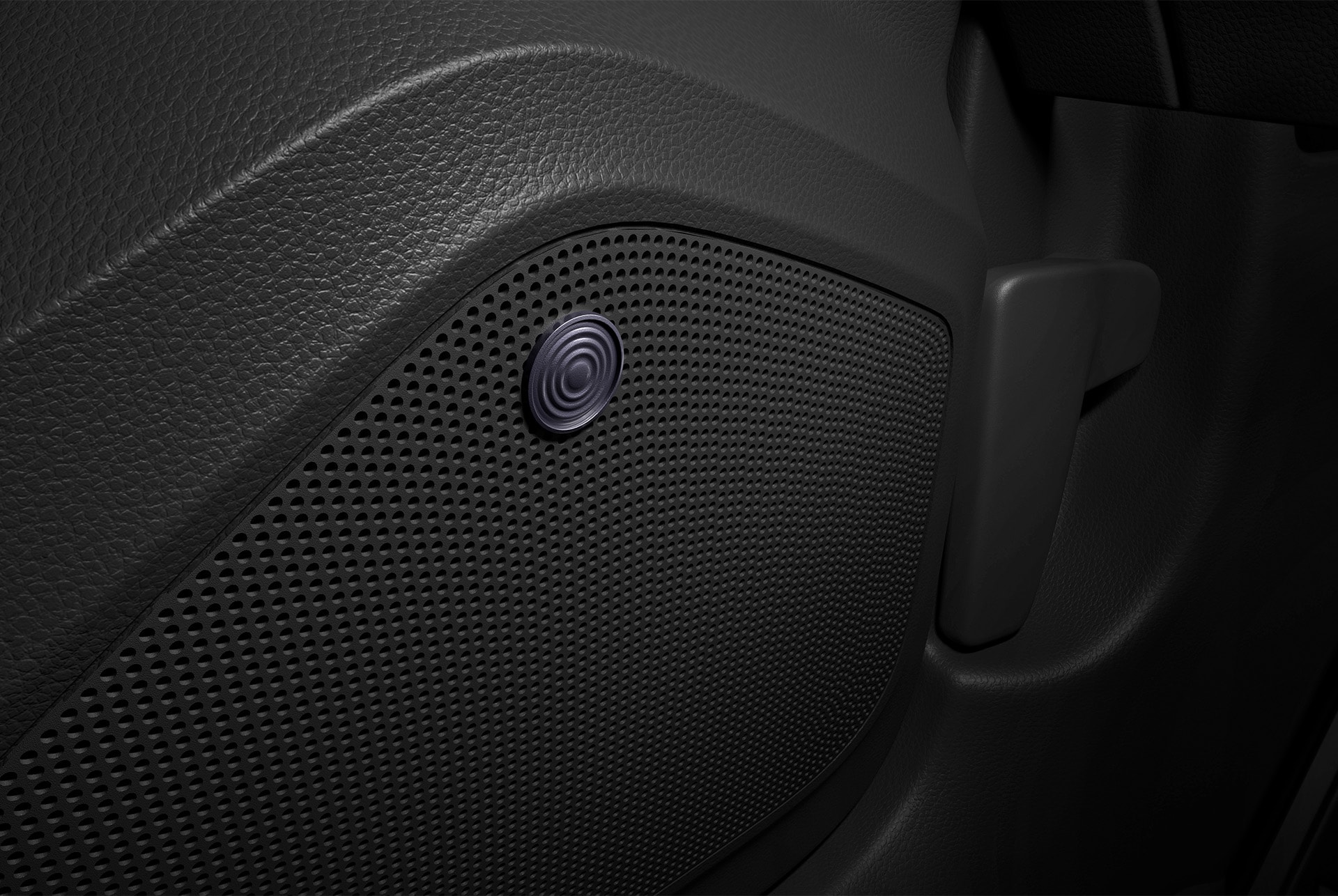 Närbild av dörrhögtalaren i CUPRA Sound System. Den visar designdetaljerna hos denna interiördetalj.