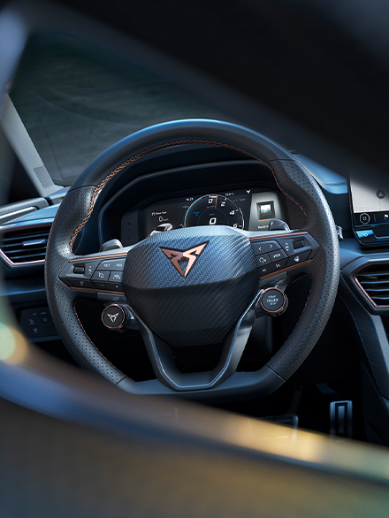 new cupra leon sportstourer vz cu e-hybrid family sports car with steering wheel satellite buttons 